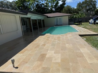 12 x 24 tile pool deck surrounding a residential swimming pool